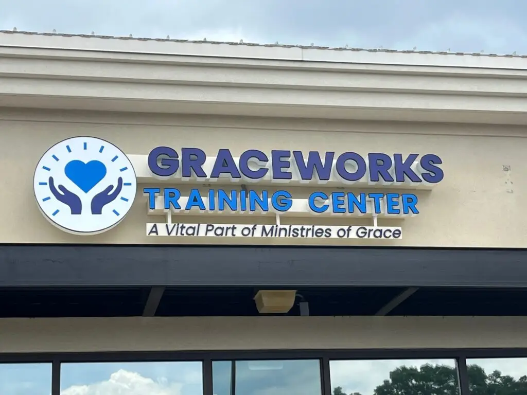 Image of the Graceworks Training Center sign. Monthly giving helps families in Georgia receive valuable benefits like job training and financial literacy training.