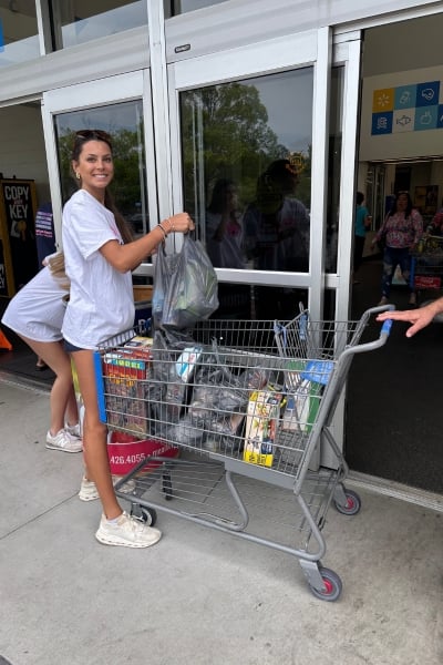 Ministries of Grace Volunteer gathering donations representing Overlooked Medical Needs: Dental and Vision Care.