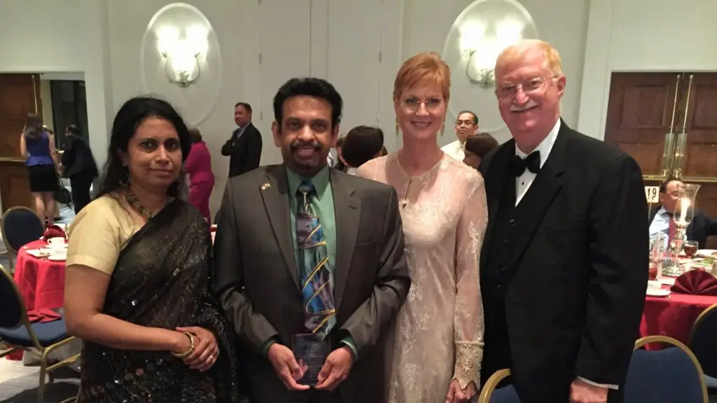 Image of Dr. Indran B. Indrakrishnan, his wife, Stephen Daniels, and Suellen Daniels of Ministries of Grace.