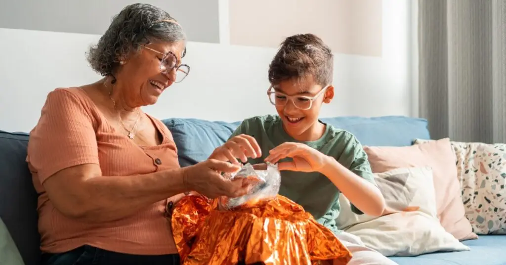 Image of a happy grandma and grandson representing The Ripple Effect of Generosity How One Gift Changes Generations.